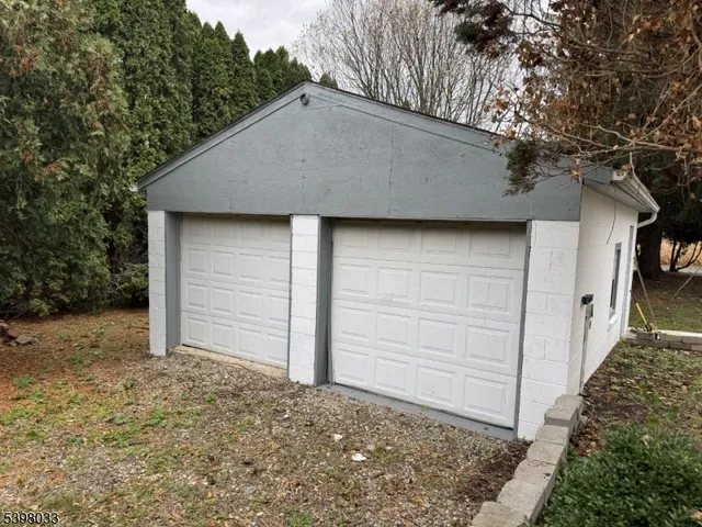 a house with trees in front of it