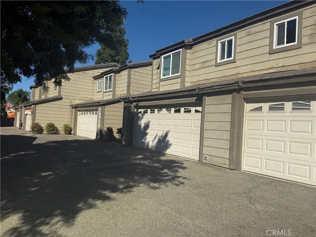 front view of a house with a street