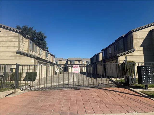 a view of a balcony with a floor to ceiling window