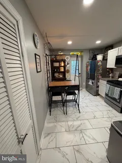 a bed room with a bed and a window