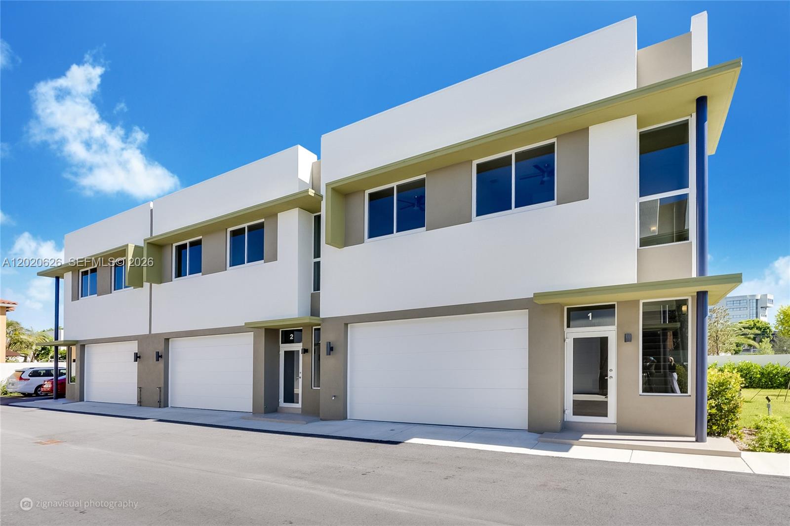 7701 Southwest 95th Terrace, Unit 1 Miami, FL 33156 - Photo 17 of 18 a front view of a house with a garage