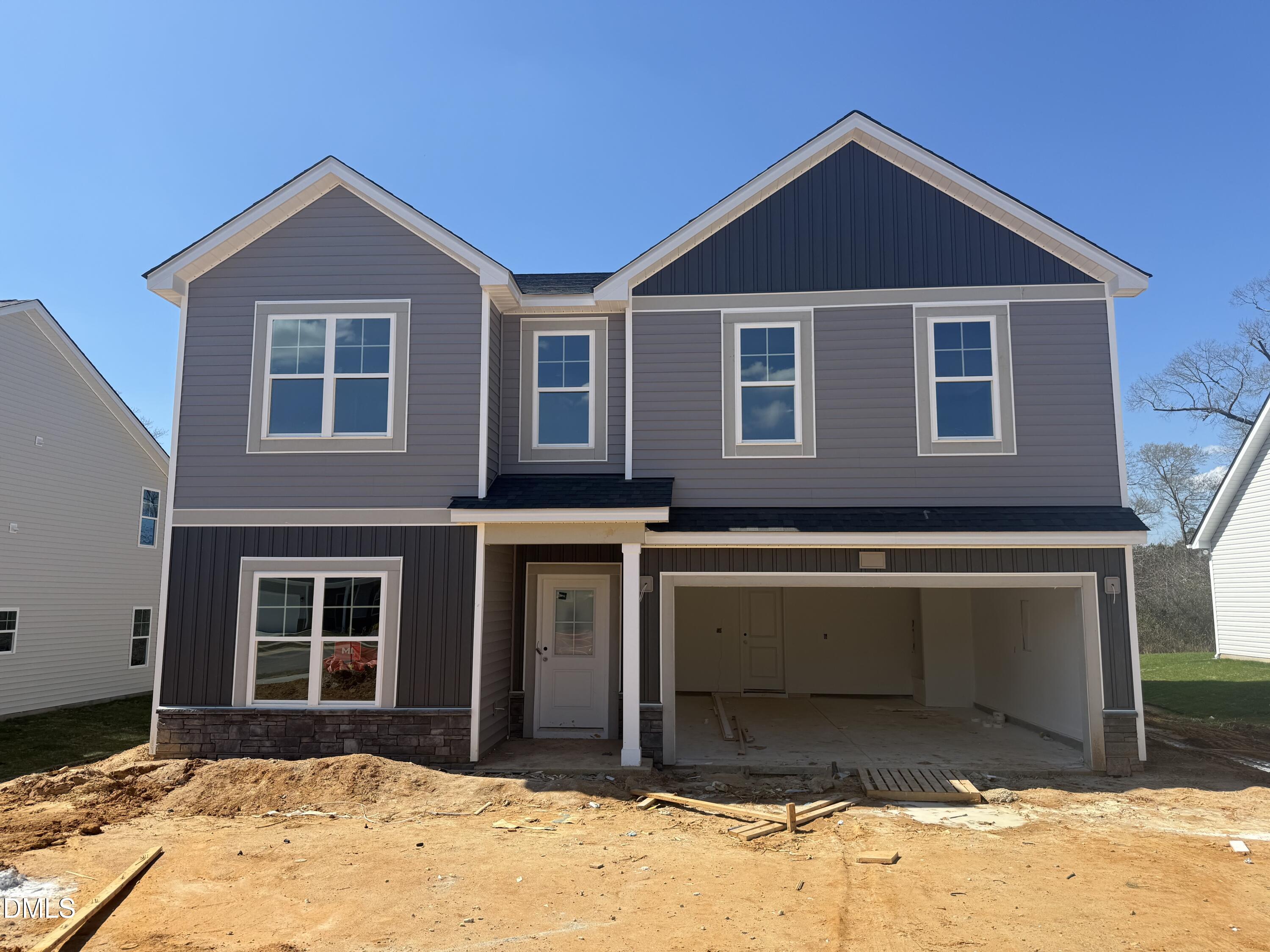 178 Brickendon Raeford, NC 28376 - Photo 1 of 15 a front view of a house with a garage