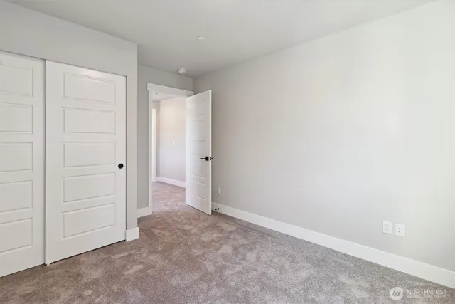 a bathroom with a sink and cabinets