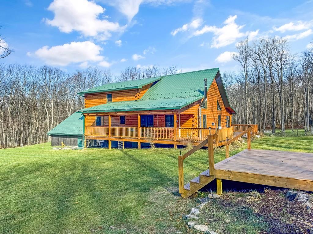 219 Wild Cat Road Windber, PA 15963 - Photo 10 of 63 a view of a house with a yard