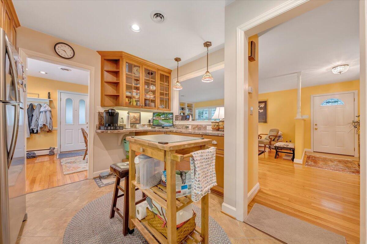2736 Beverly Boulevard Southwest Roanoke, VA 24015 - Photo 23 of 41 a kitchen with a table chairs and a view of living room