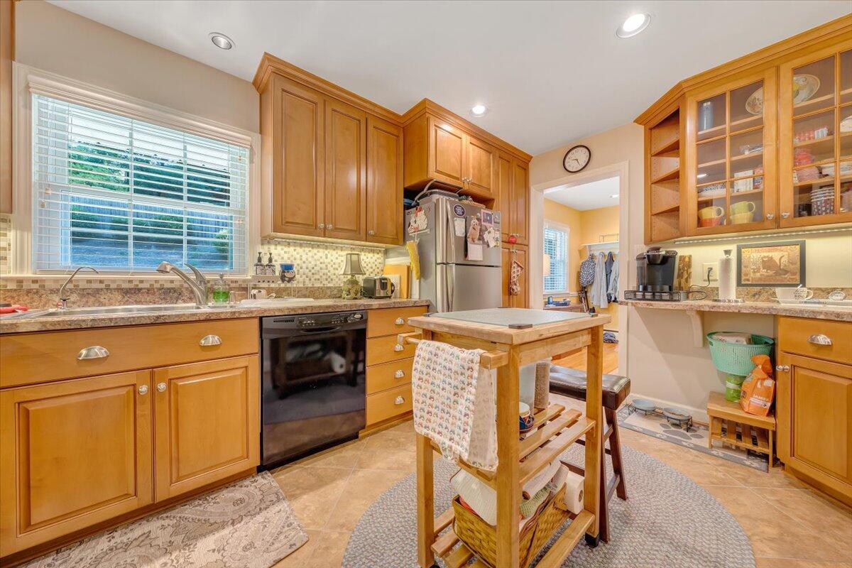 2736 Beverly Boulevard Southwest Roanoke, VA 24015 - Photo 24 of 41 a kitchen with stainless steel appliances granite countertop a stove and a refrigerator