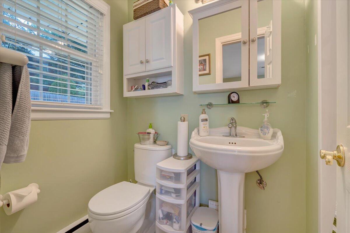 2736 Beverly Boulevard Southwest Roanoke, VA 24015 - Photo 30 of 41 a bathroom with a sink toilet and mirror