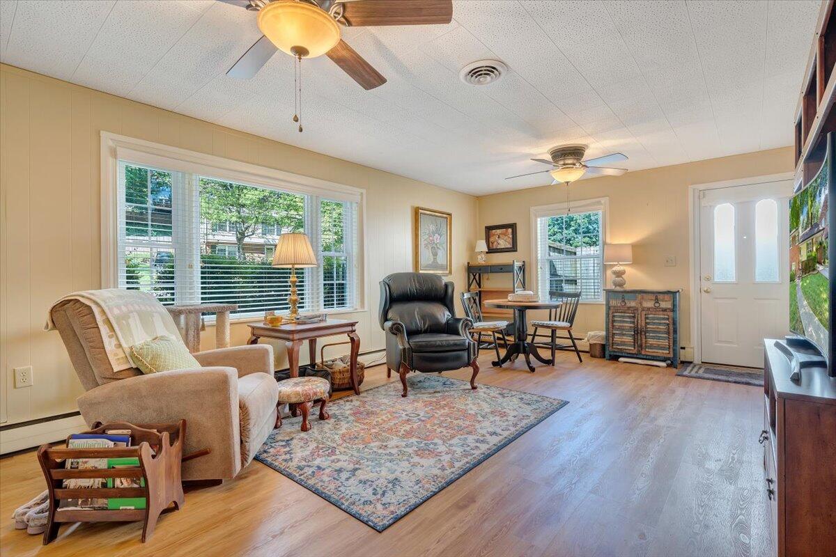 2736 Beverly Boulevard Southwest Roanoke, VA 24015 - Photo 33 of 41 a living room with furniture and wooden floor