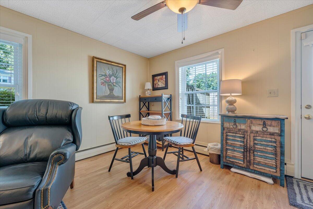 2736 Beverly Boulevard Southwest Roanoke, VA 24015 - Photo 36 of 41 a living room with furniture and a wooden floor