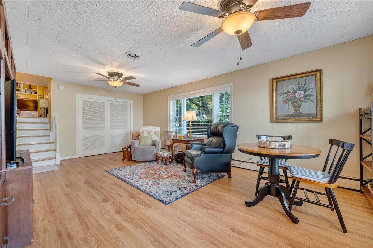 2736 Beverly Boulevard Southwest Roanoke, VA 24015 - Photo 37 of 41 a living room with furniture and a chandelier