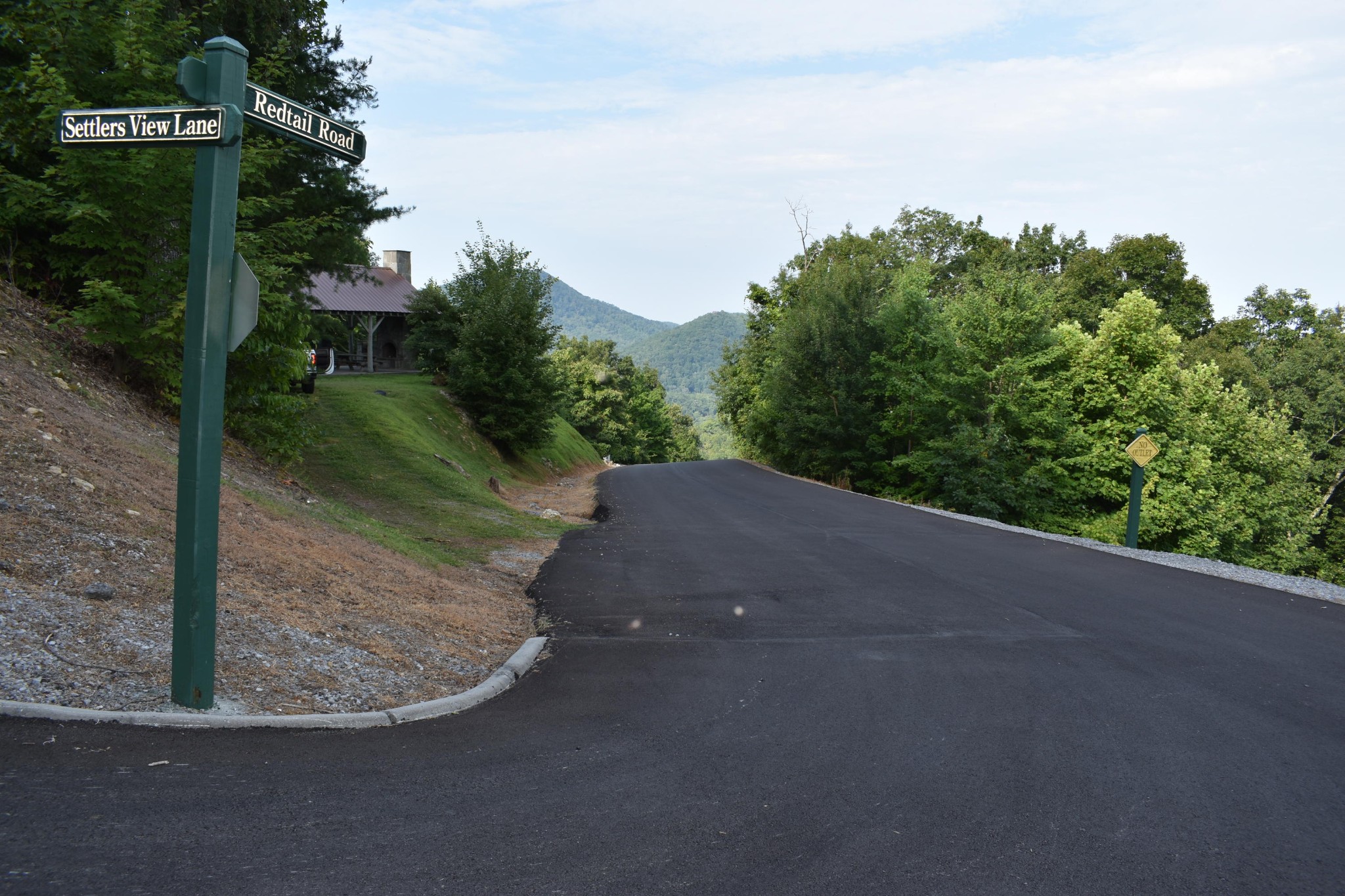 3036 Redtail Road Sevierville, TN 37862 - Photo 4 of 24 a view of a street with a trees in the background