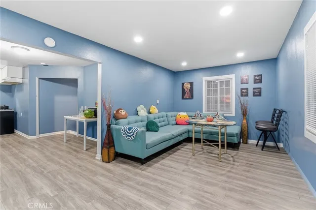 a living room with furniture and a table