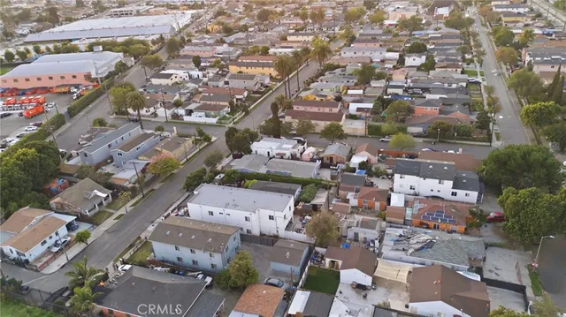 an aerial view of a city with lots of residential buildings