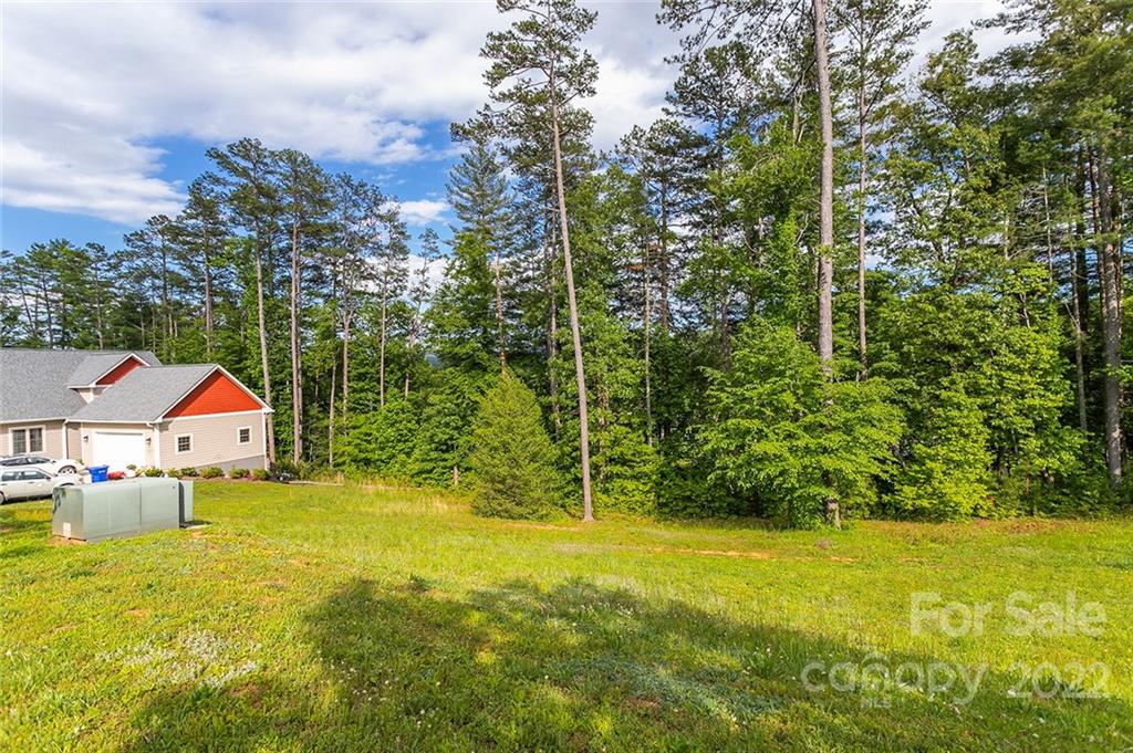 Tbd Cadence Circle, Unit THREE DEVELOPER LOTS Brevard, NC 28712 - Photo 12 of 16 a view of a swimming pool with an outdoor seating and yard