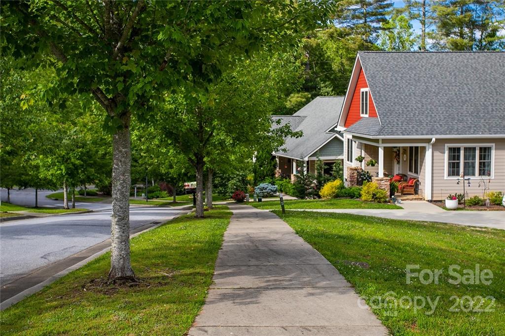 Tbd Cadence Circle, Unit THREE DEVELOPER LOTS Brevard, NC 28712 - Photo 5 of 16 a front view of house with yard and green space
