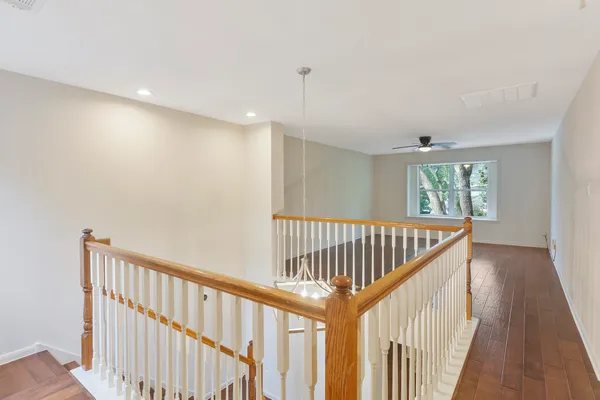 a view of staircase with rug floor