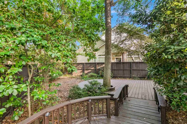 a view of balcony with wooden floor and outdoor space