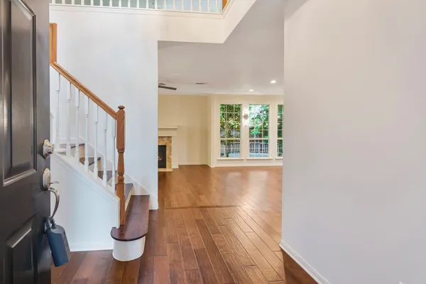 a view of entryway with wooden floor