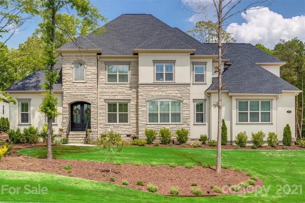 2886 Holbrook Road Fort Mill, SC 29715 - Photo 1 of 34 a front view of a house with garden