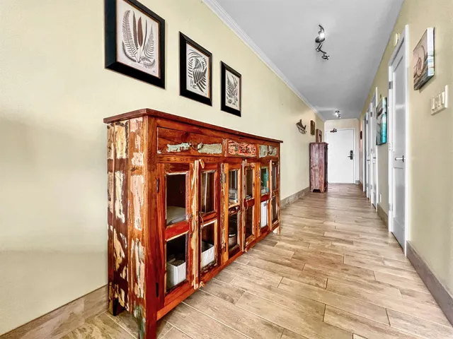 a view of a hallway with stairs