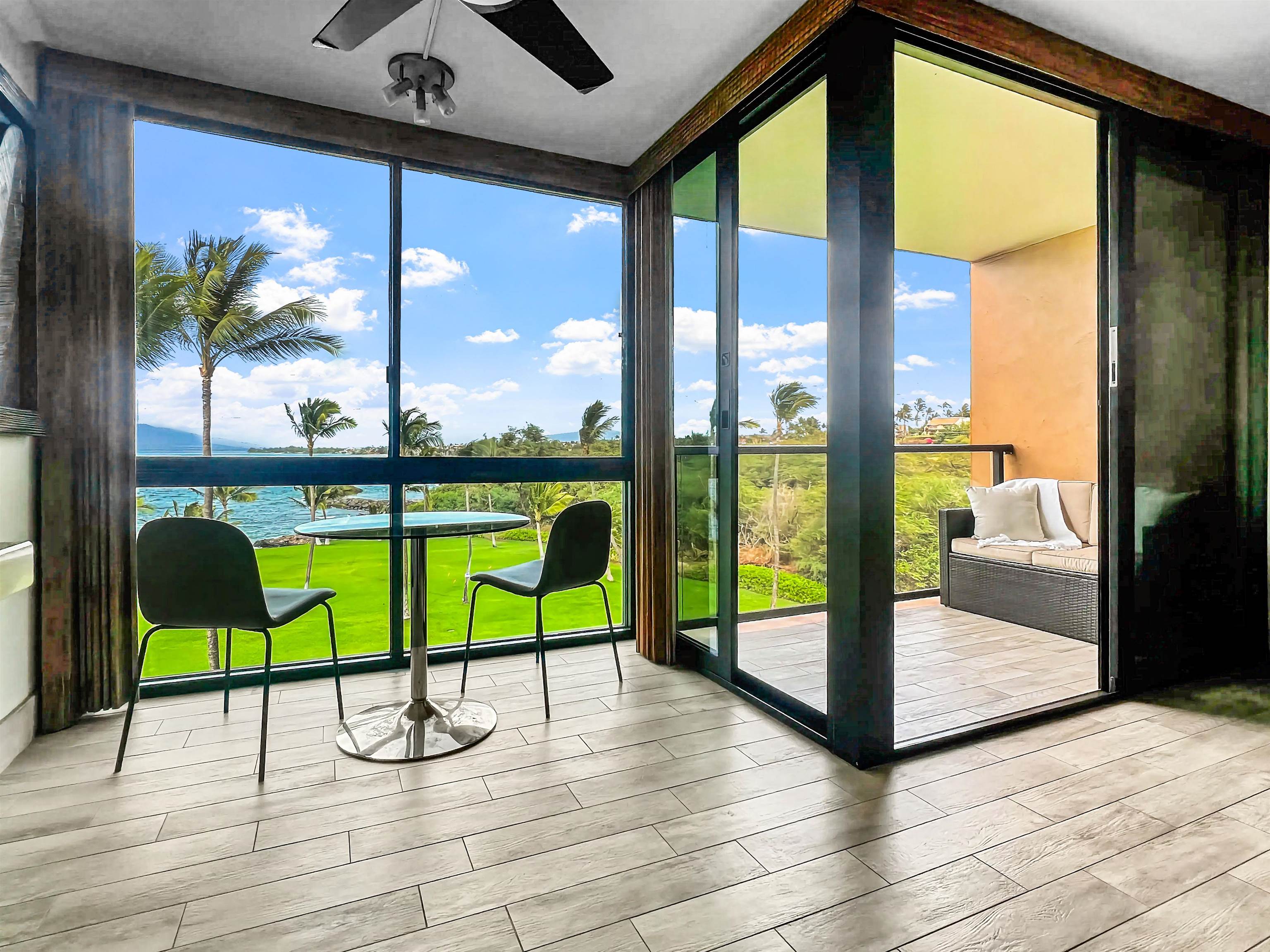 2936 South Kihei Road, Unit 512 Kihei, HI 96753 - Photo 3 of 20 a view of an outdoor space with furniture and windows