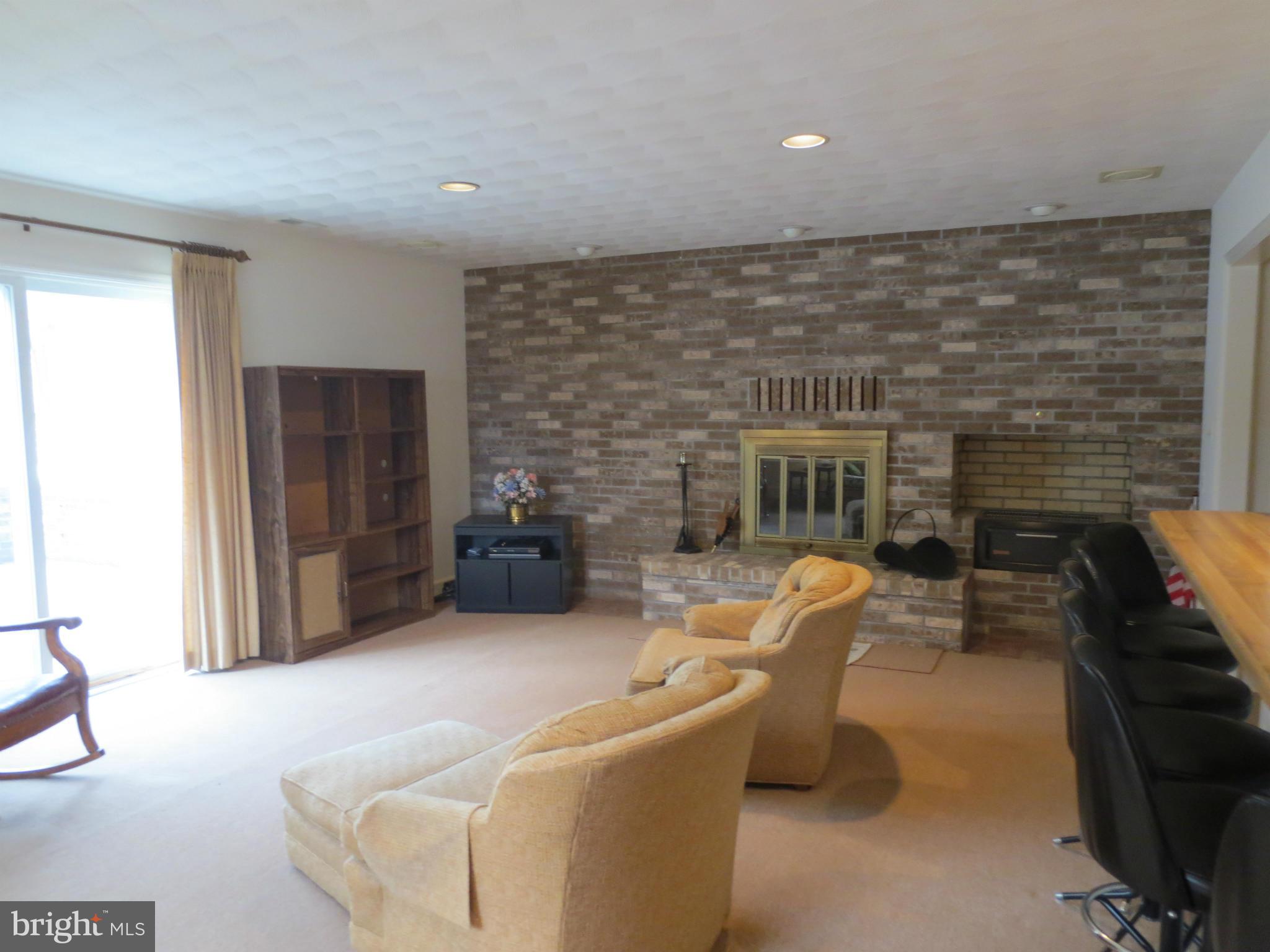 1512 Rolling Road Bel Air, MD 21014 - Photo 17 of 30 Family Room with gas fireplace and grill