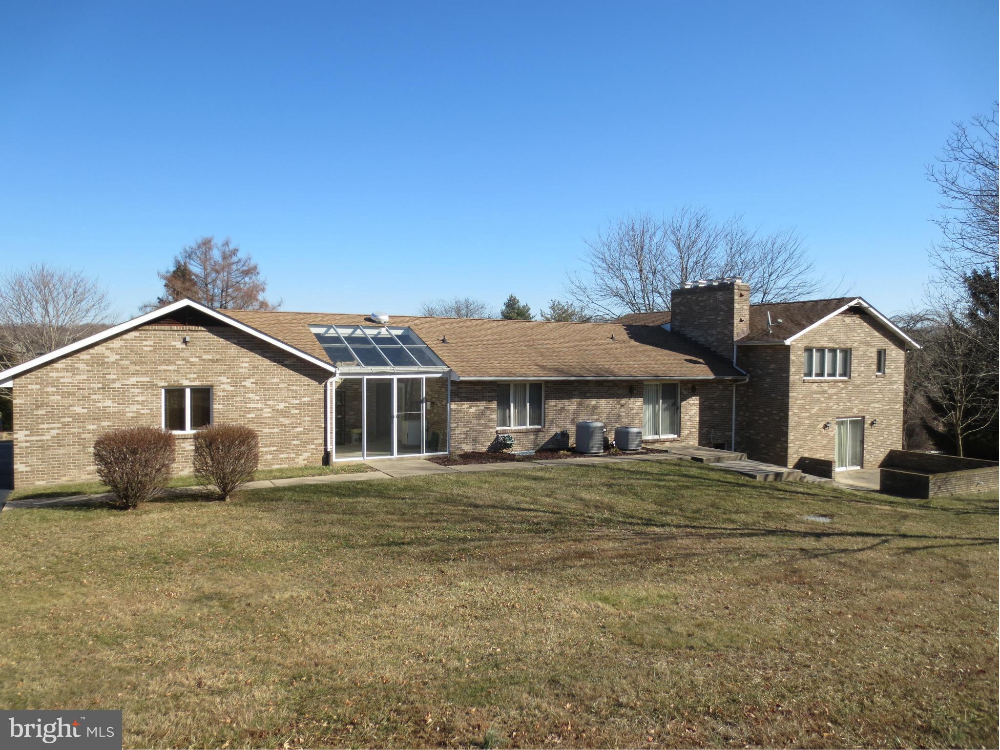 1512 Rolling Road Bel Air, MD 21014 - Photo 26 of 30 Exterior (Rear)-Greenhouse and patio