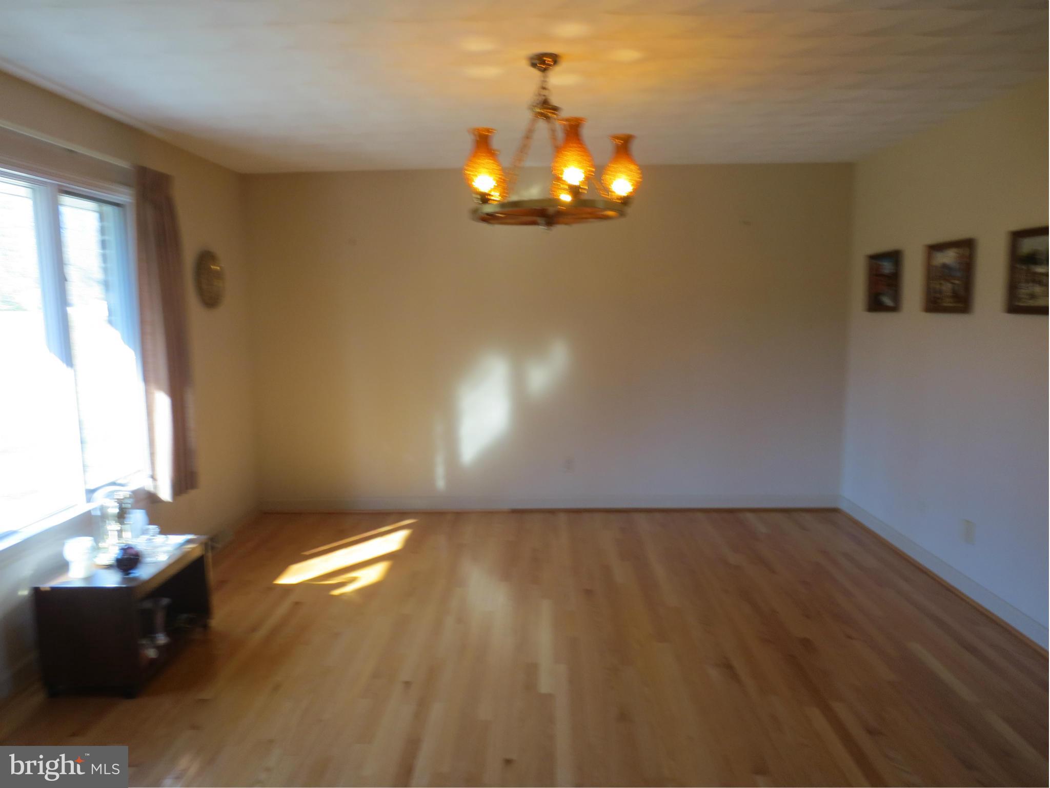 1512 Rolling Road Bel Air, MD 21014 - Photo 7 of 30 Dining Room with hardwood floors