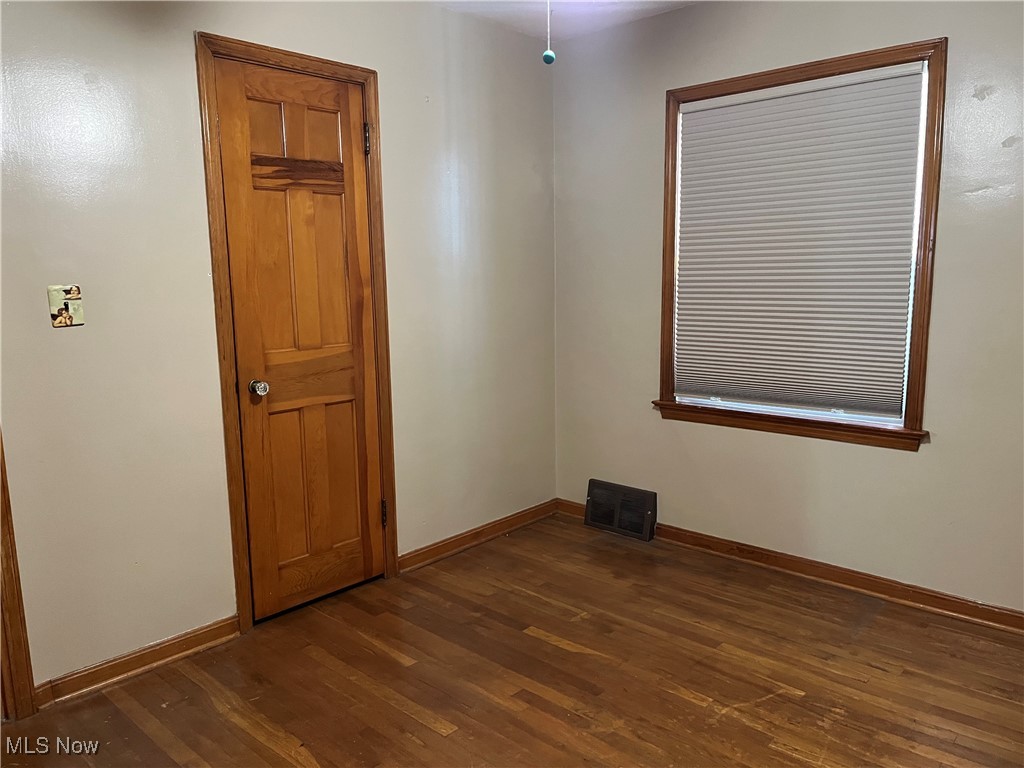 15405 Corkhill Road Maple Heights, OH 44137 - Photo 28 of 50 Front Bedroom with hardwood floors, closet and windows.