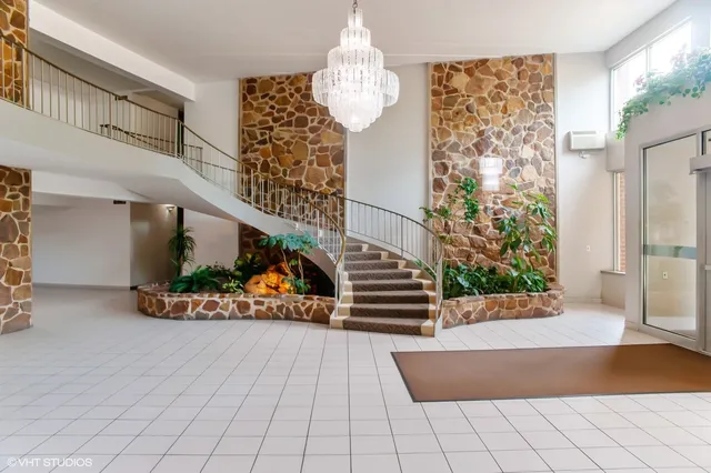a view of a porch with a floor to ceiling window
