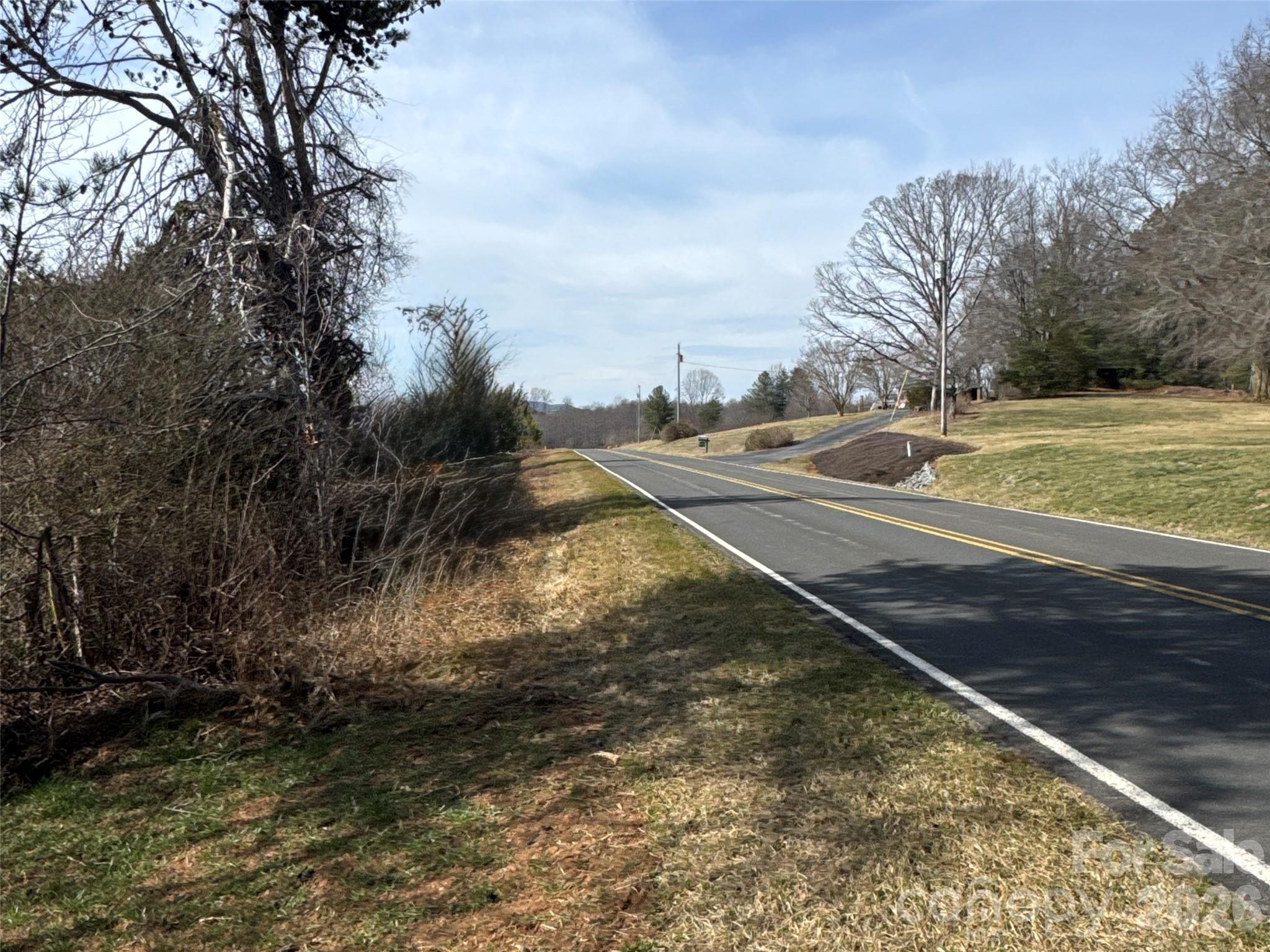 0 Cooksville Road Vale, NC 28168 - Photo 22 of 24 a view of a yard with wooden fence