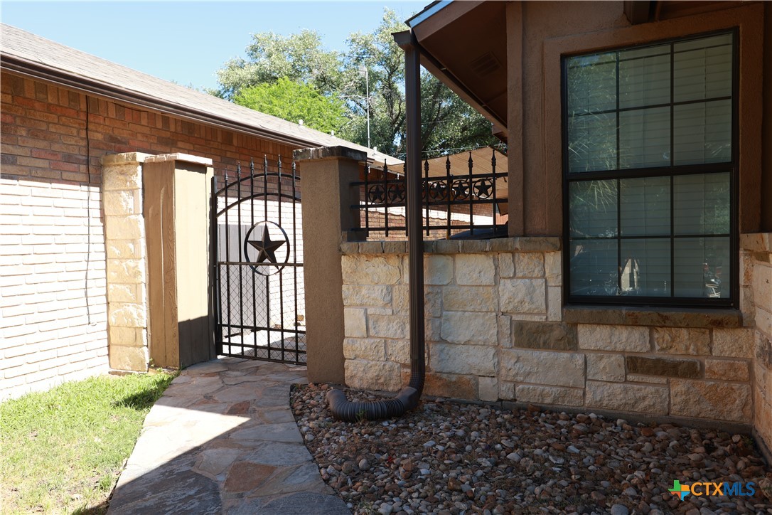 2706 Bowie Trail Temple, TX 76502 - Photo 25 of 25 a front view of a house with a yard