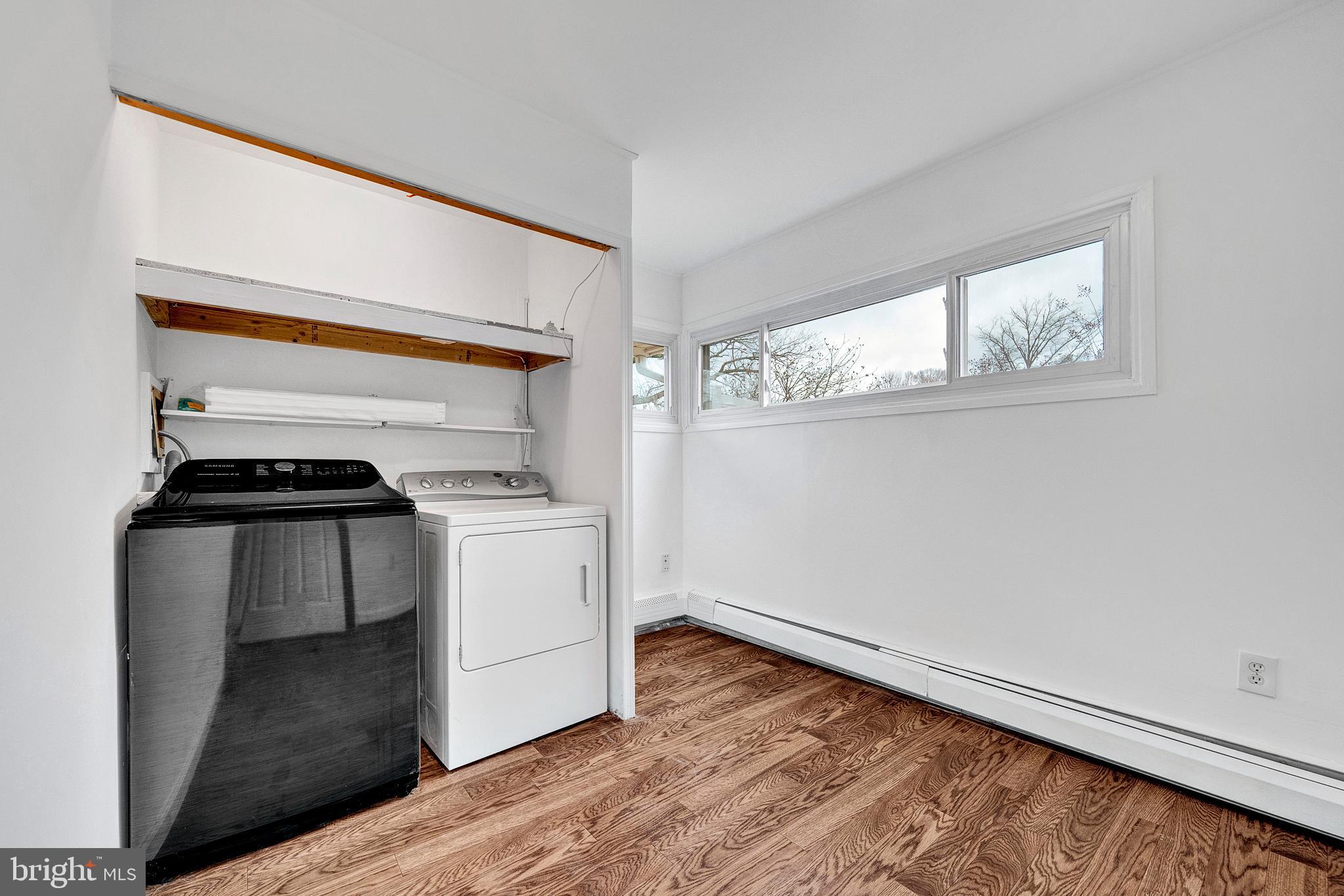 6 Unity Turn Levittown, PA 19056 - Photo 27 of 50 a utility room with washer and dryer