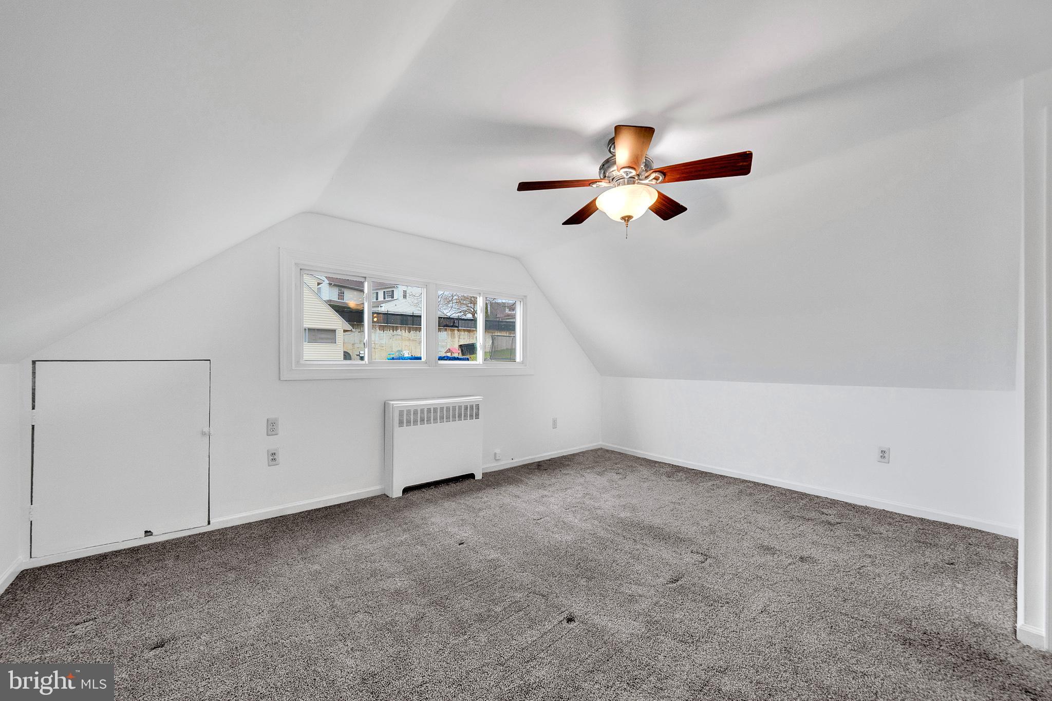 6 Unity Turn Levittown, PA 19056 - Photo 31 of 50 an empty room with fan and windows