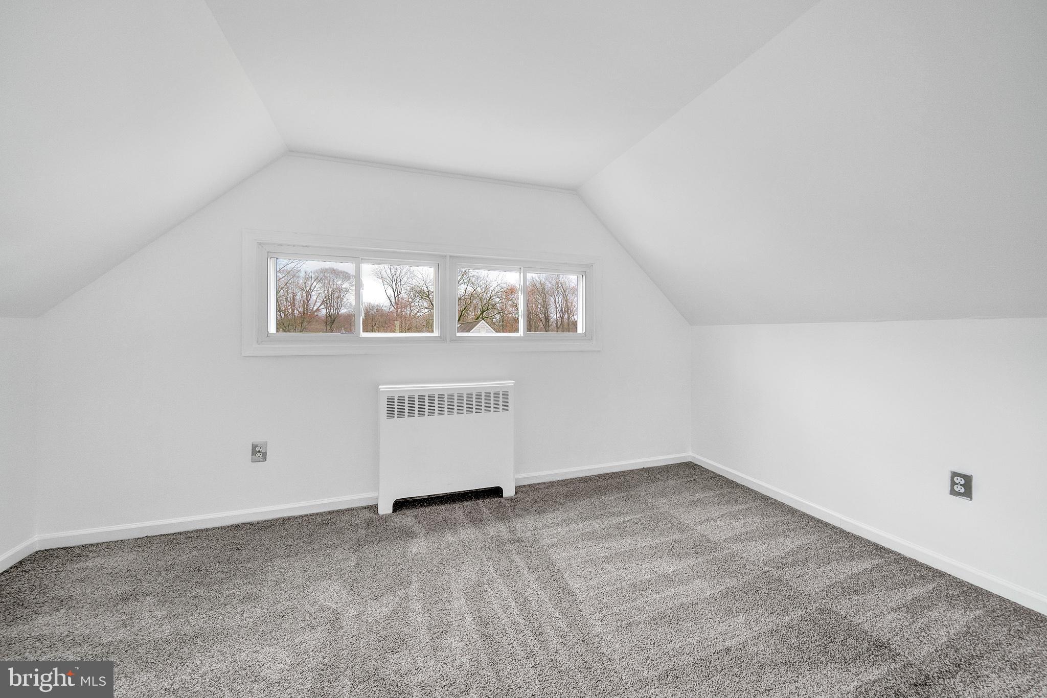 6 Unity Turn Levittown, PA 19056 - Photo 34 of 50 an empty room with windows