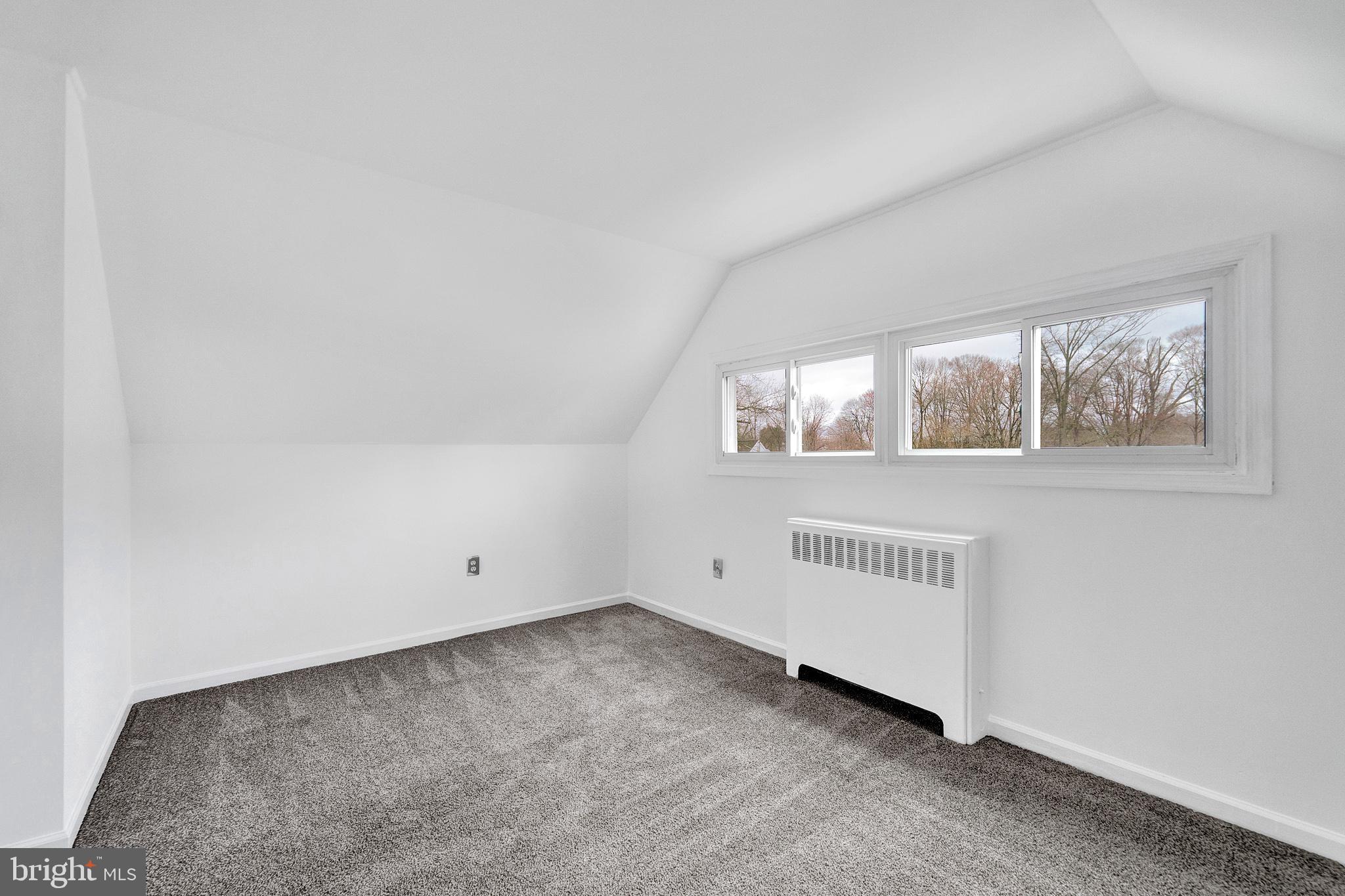 6 Unity Turn Levittown, PA 19056 - Photo 36 of 50 an empty room with windows