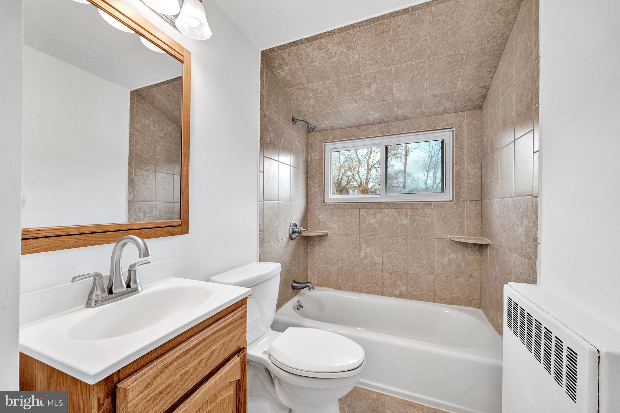 6 Unity Turn Levittown, PA 19056 - Photo 37 of 50 a bathroom with a sink toilet and shower