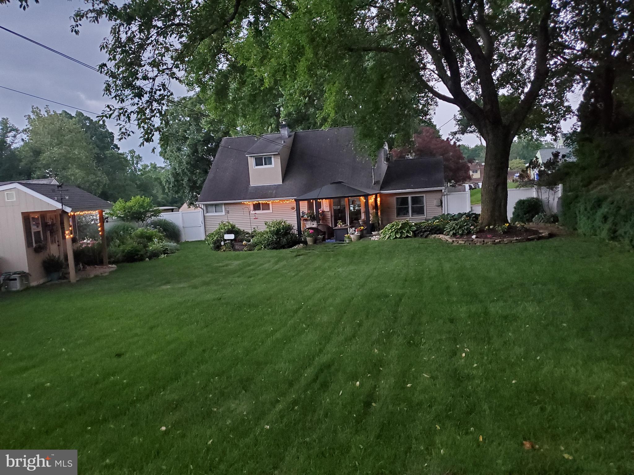6 Unity Turn Levittown, PA 19056 - Photo 43 of 50 a view of a house with a yard