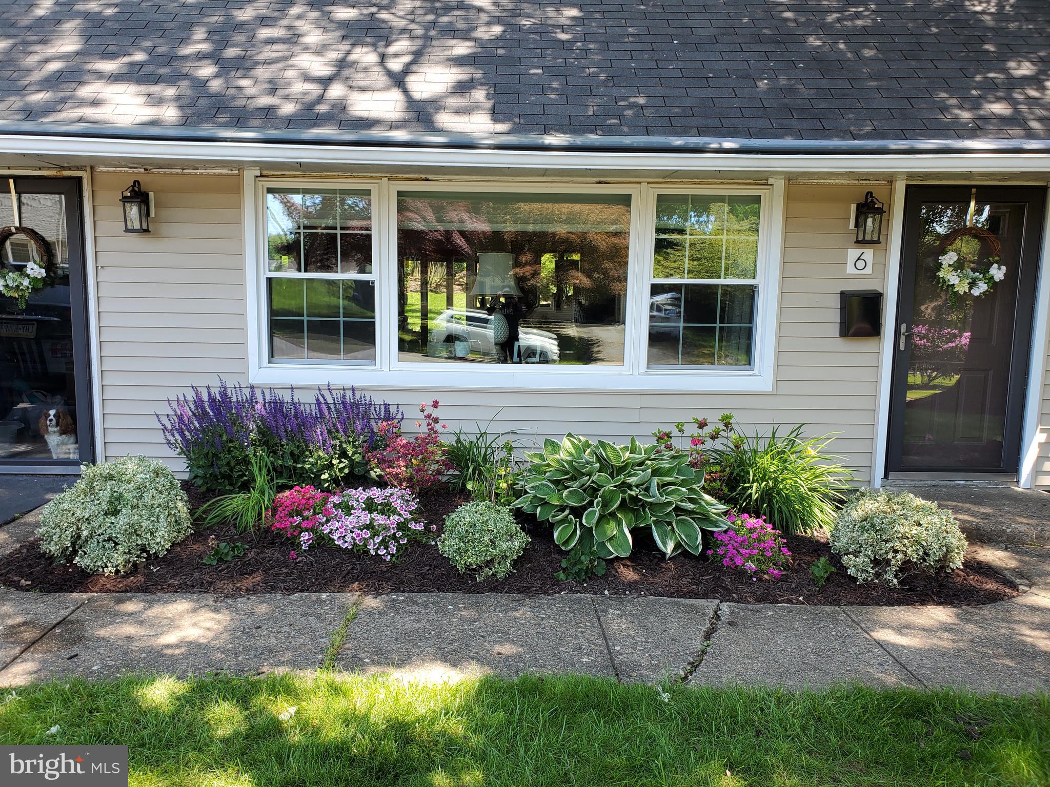 6 Unity Turn Levittown, PA 19056 - Photo 5 of 50 front view of a house with a yard
