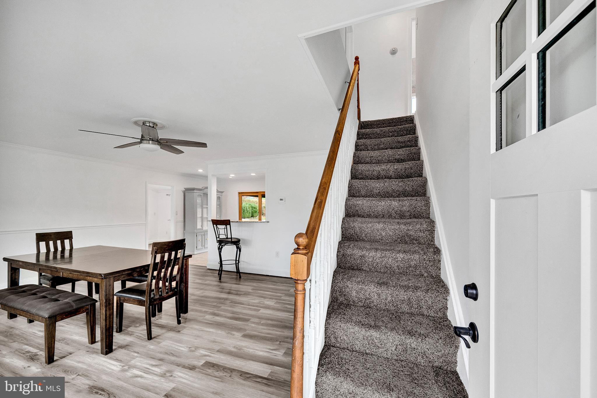6 Unity Turn Levittown, PA 19056 - Photo 7 of 50 a view of entryway and hall with wooden floor