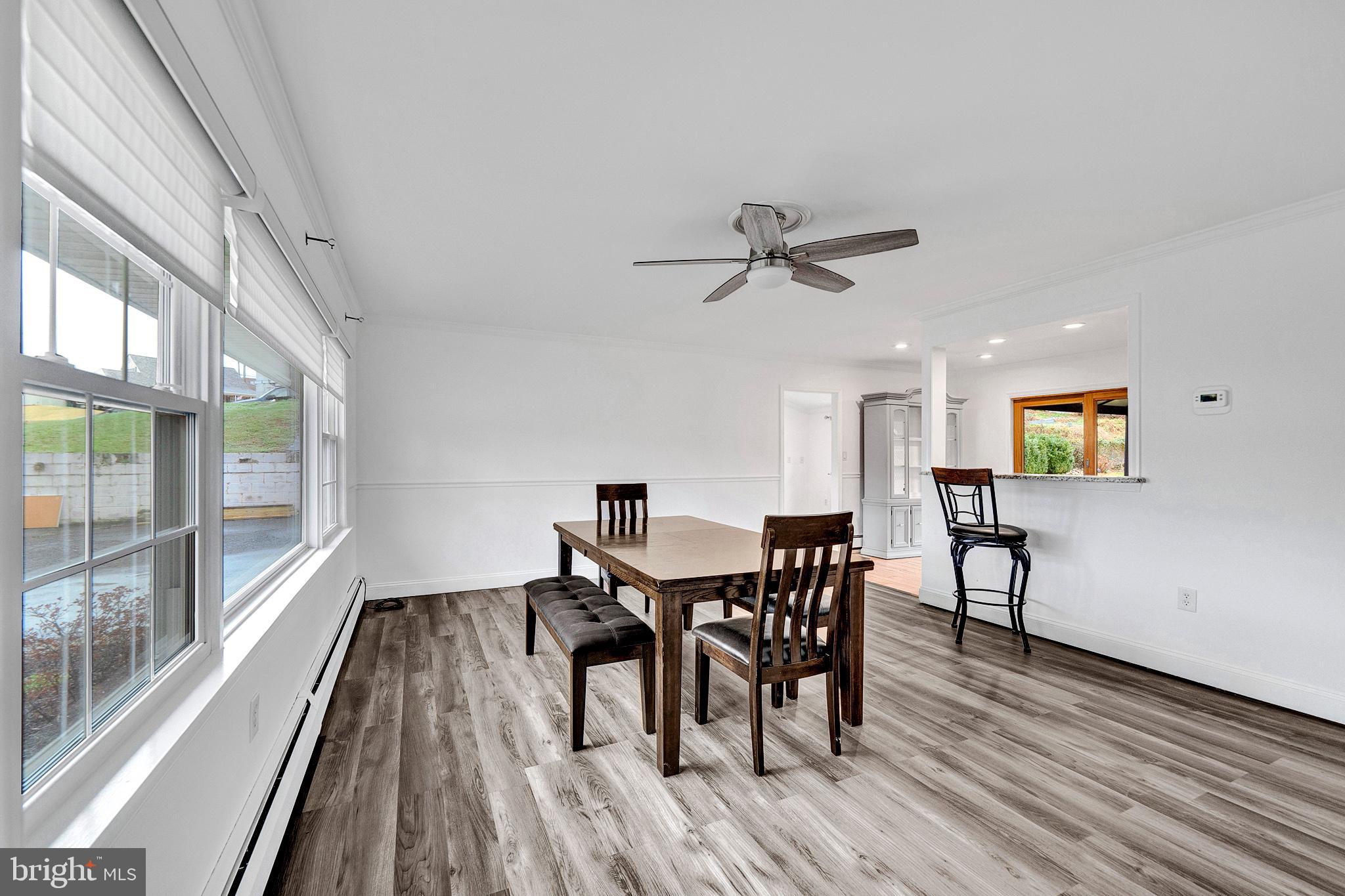 6 Unity Turn Levittown, PA 19056 - Photo 8 of 50 a view of a dining room with furniture window and wooden floor