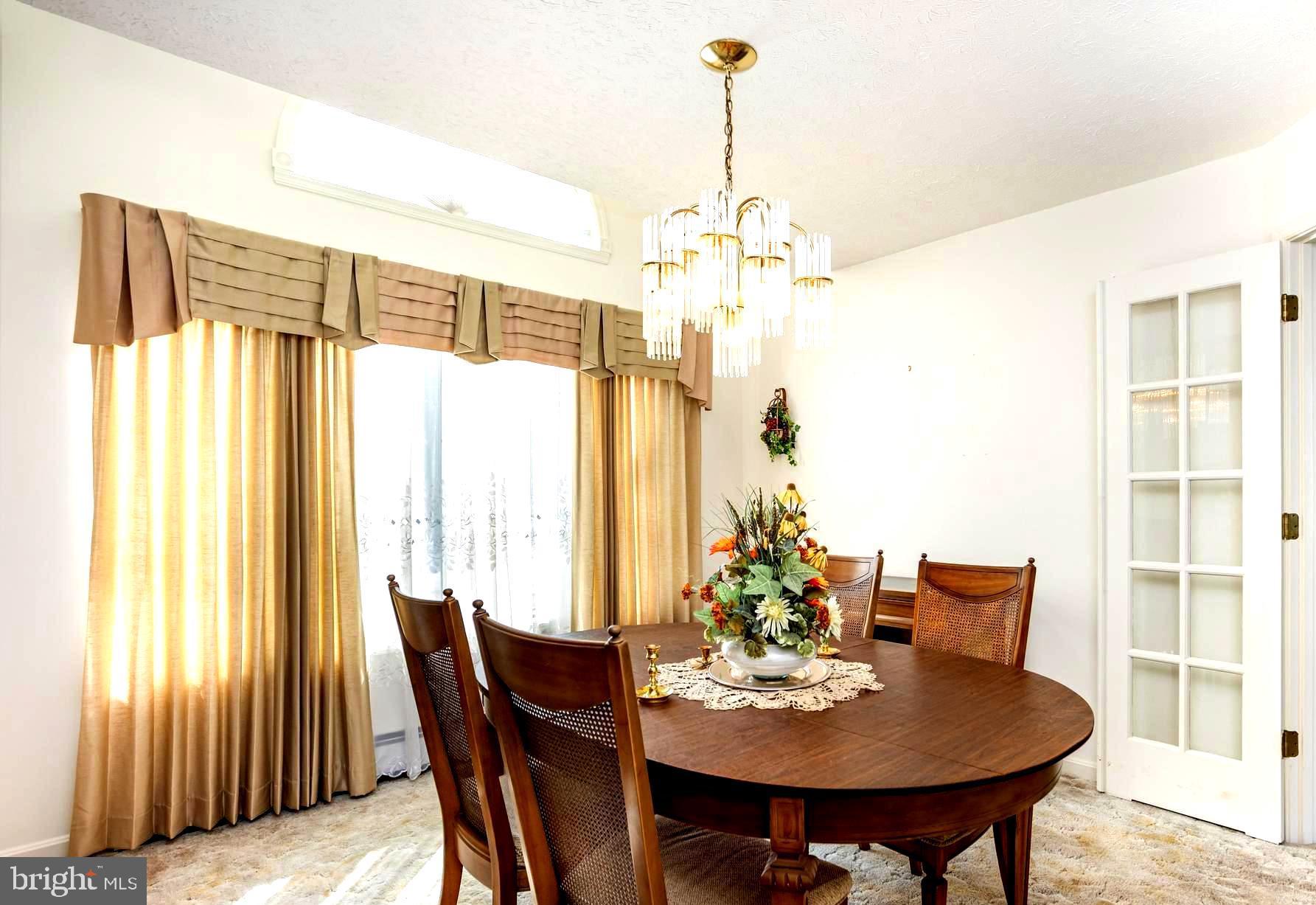 7252 Meadow Lane Baltimore, MD 21222 - Photo 12 of 80 a view of a dining room with furniture window and outside view