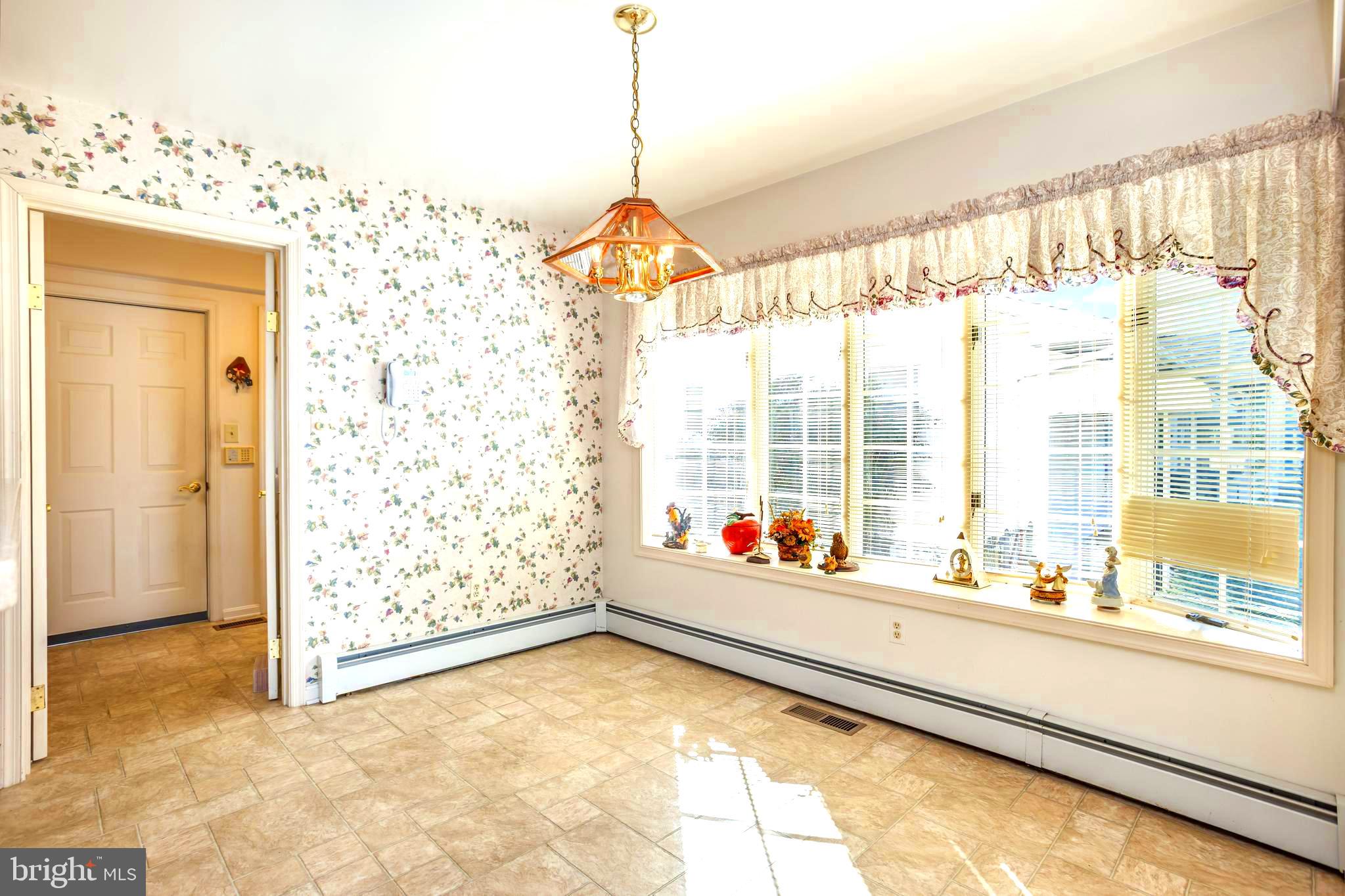 7252 Meadow Lane Baltimore, MD 21222 - Photo 18 of 80 Dining room with beautiful bay window