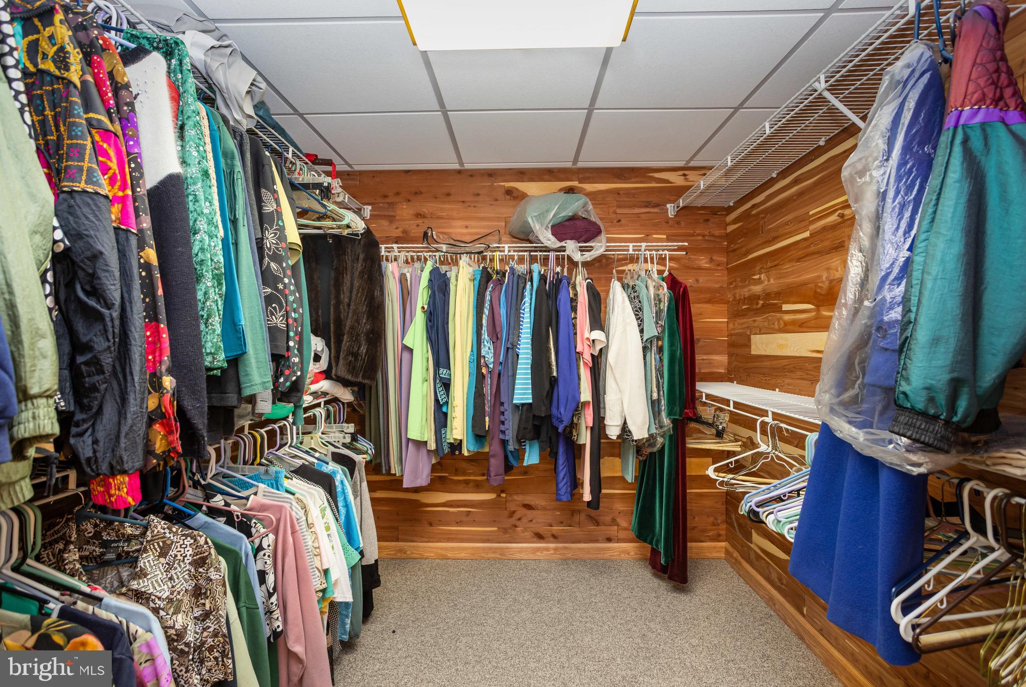 7252 Meadow Lane Baltimore, MD 21222 - Photo 31 of 80 a view of walk in closet with clothes