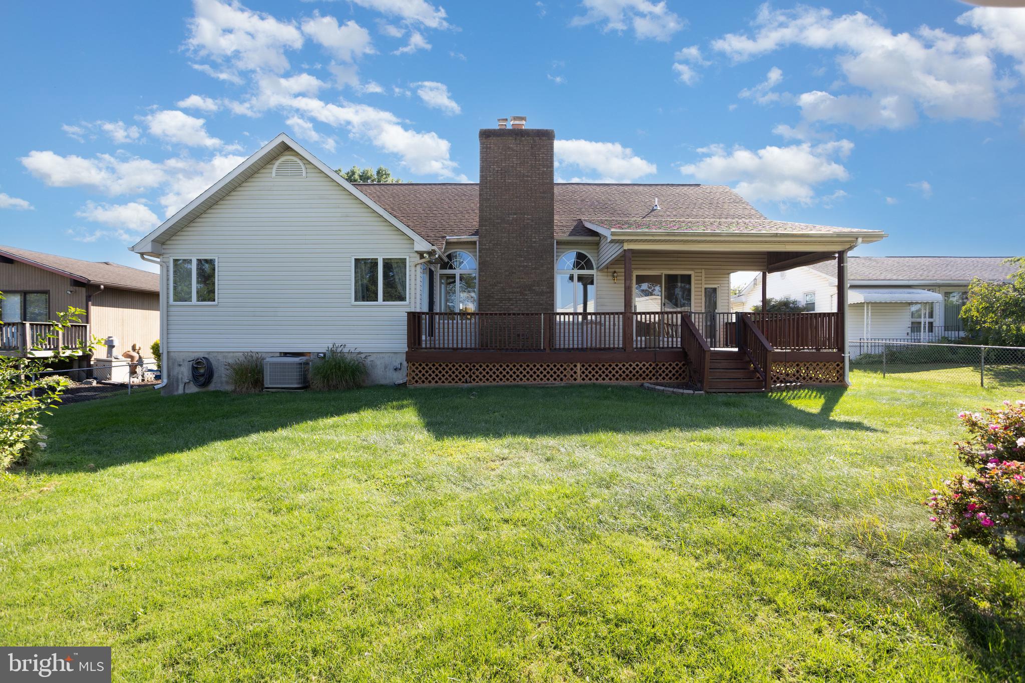 7252 Meadow Lane Baltimore, MD 21222 - Photo 35 of 80 a front view of house with a garden and patio
