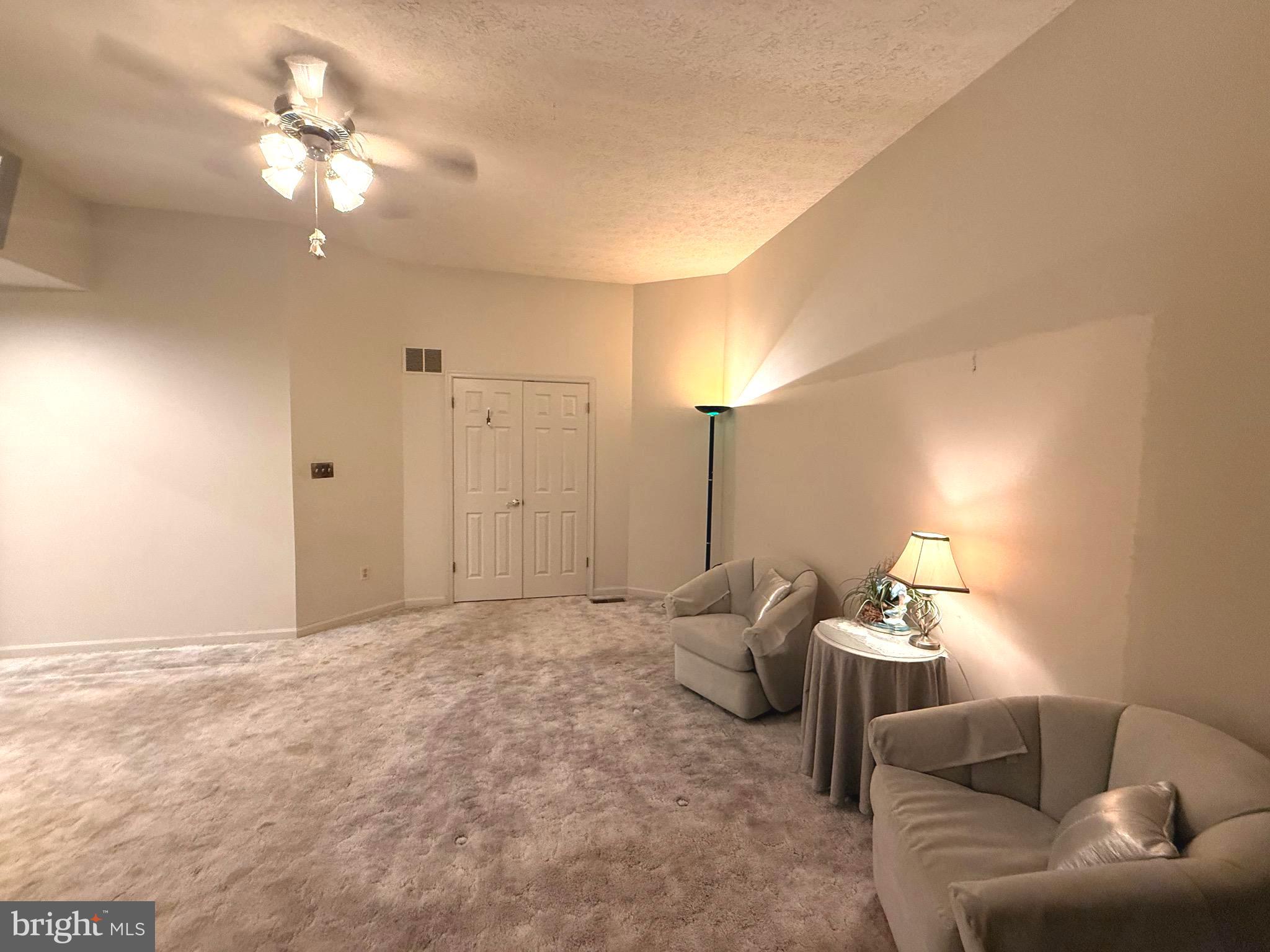 7252 Meadow Lane Baltimore, MD 21222 - Photo 46 of 80 a living room with furniture