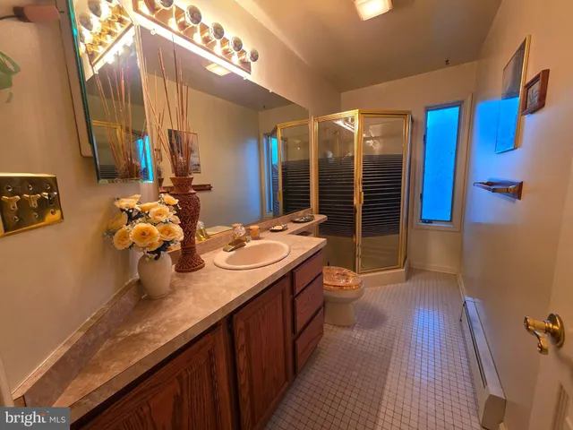 a kitchen with furniture and a stove