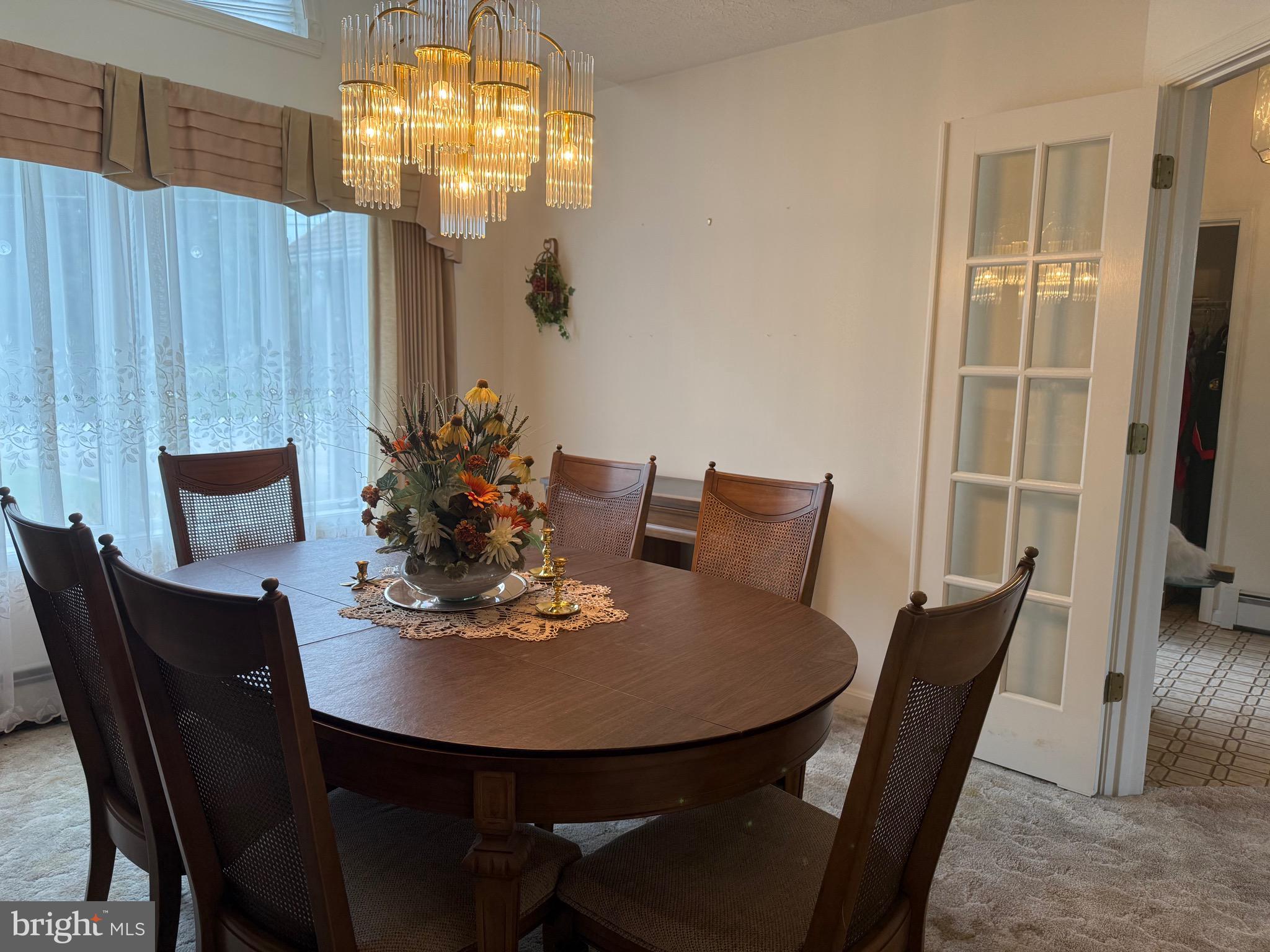 7252 Meadow Lane Baltimore, MD 21222 - Photo 58 of 80 a view of a dining room with furniture and window