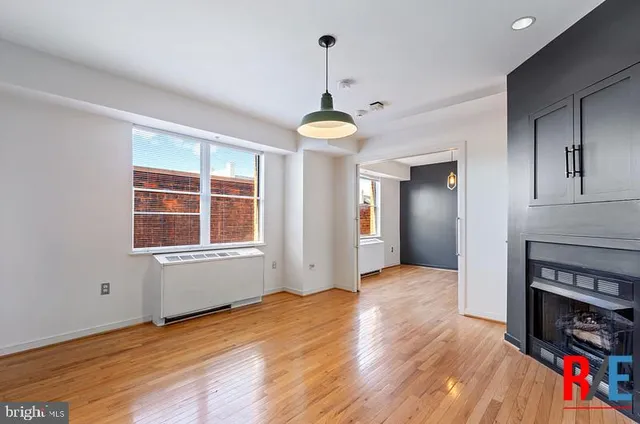 a view of livingroom with hardwood floor and window