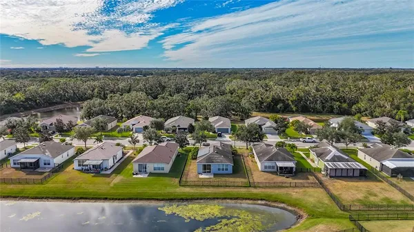 an aerial view of a house with a garden